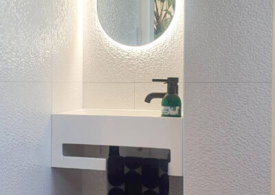 Sink with light up mirror